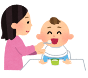 離乳食を与えているイラスト