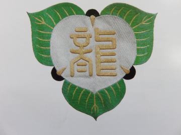 写真:龍華小学校 校章