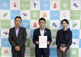 写真：田中委員長（写真左）、清水副委員長（写真右）