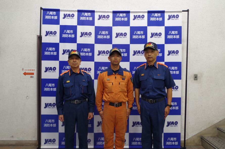 写真:消防長、派遣職員、消防署長